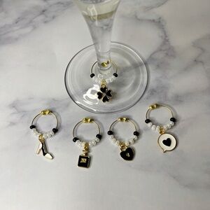 2/$15 ❤️❤️Black, white and gold wine charms